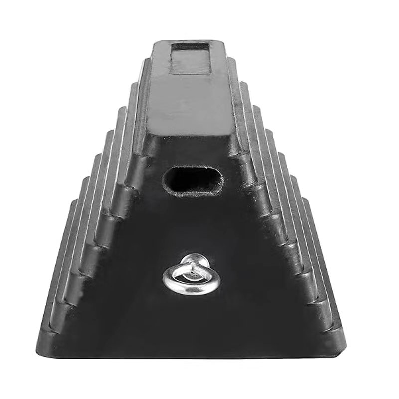 a black plastic object with a hole