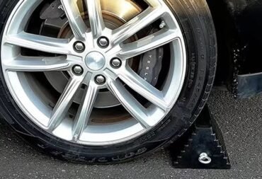 a car with a car wheel chock