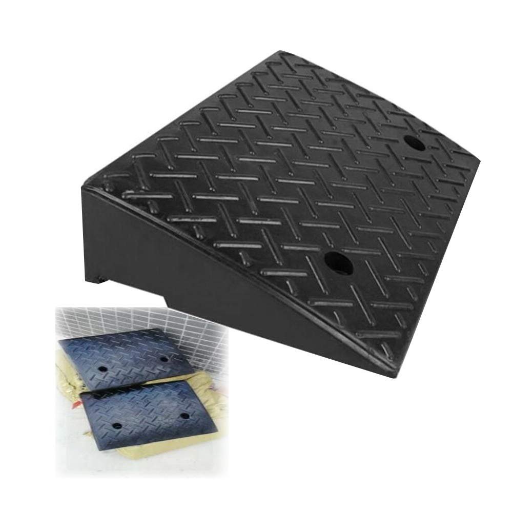 a black metal block with holes